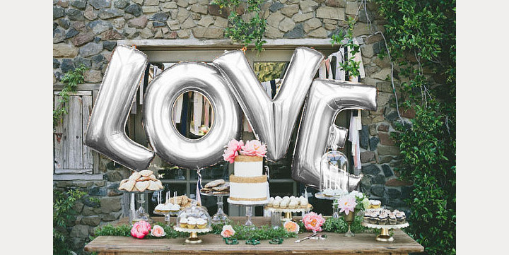 wedding planning design decor unique ceremony reception venue balloons fun love bride groom engagement vows alter tradition married lettering sign desert bar nylon letters photography photo op 