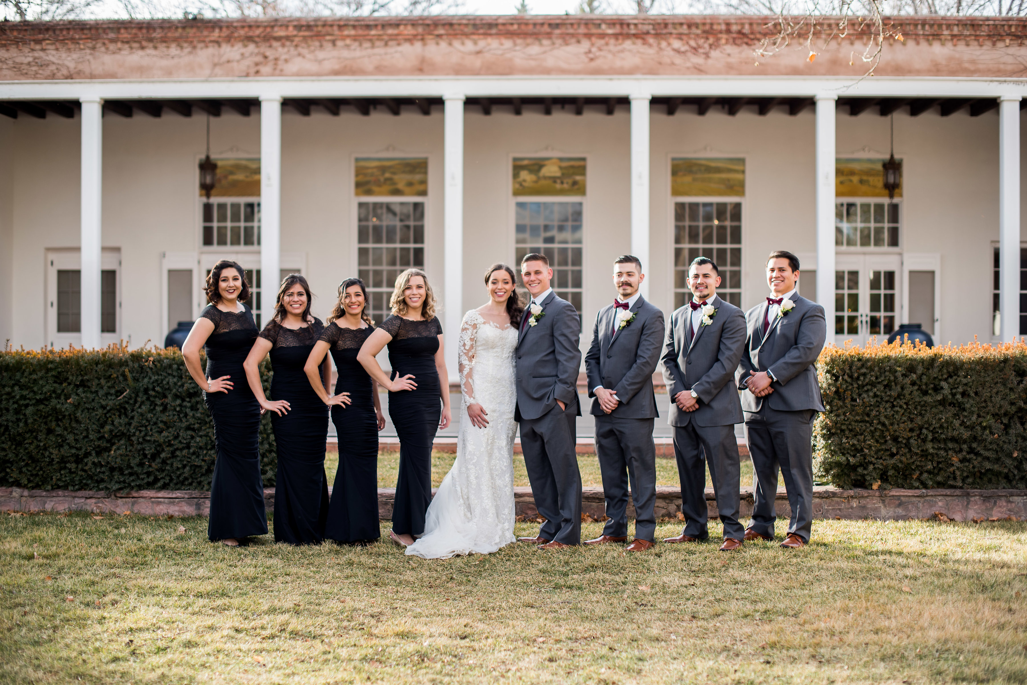 wedding planning design decor inspo real local New Mexico Perfect Wedding Guide party bridesmaids groomsmen lace long sleeve group outdoor natural light bride groom love romantic professional